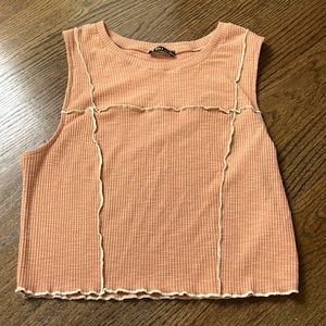 Pink tank top. Stitch detailing. Worn a few times still good condition.